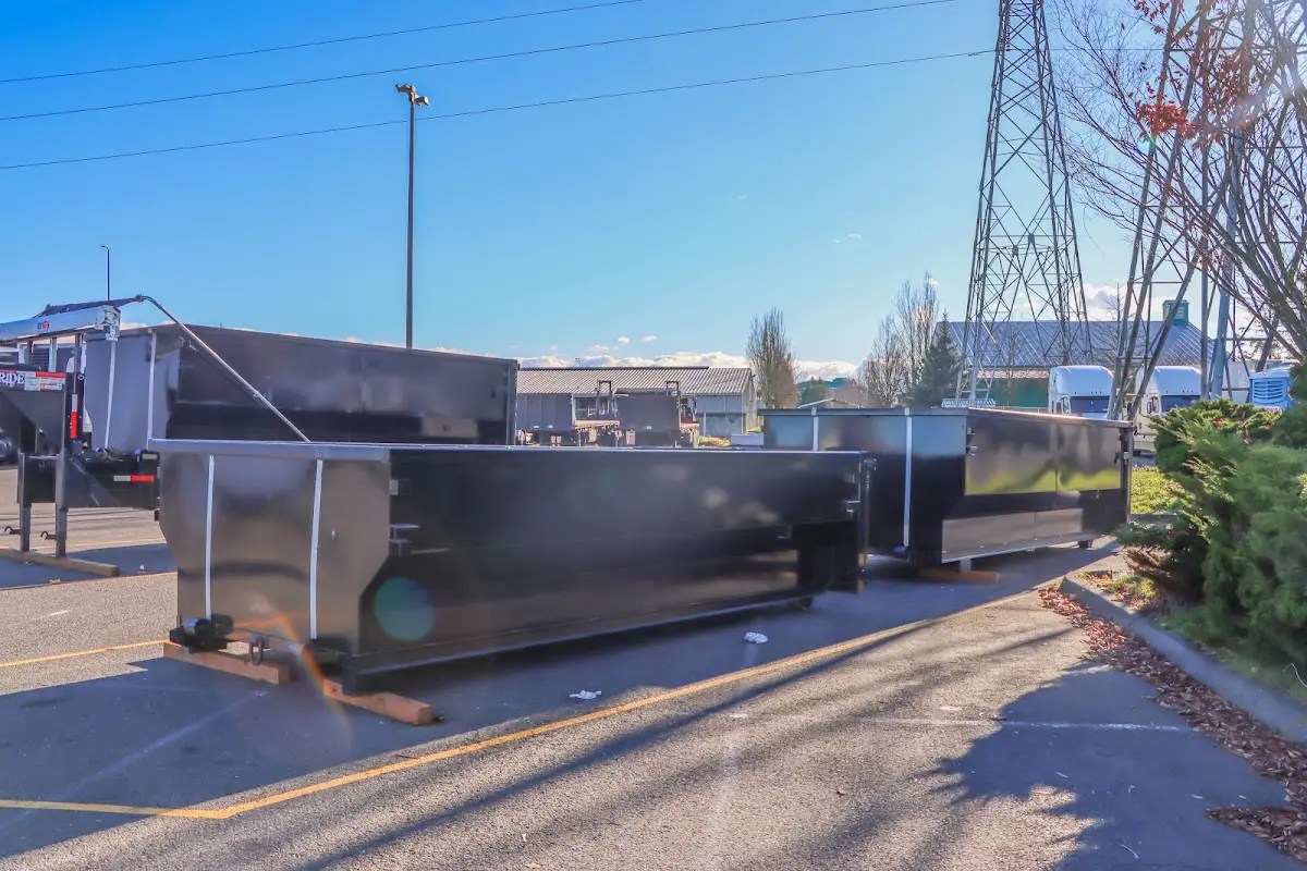 Roll-off dumpster ready for waste disposal at job site for Construction Dumpster Rental in Parkersburg